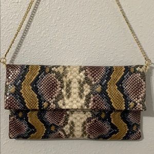 Snake skin print clutch